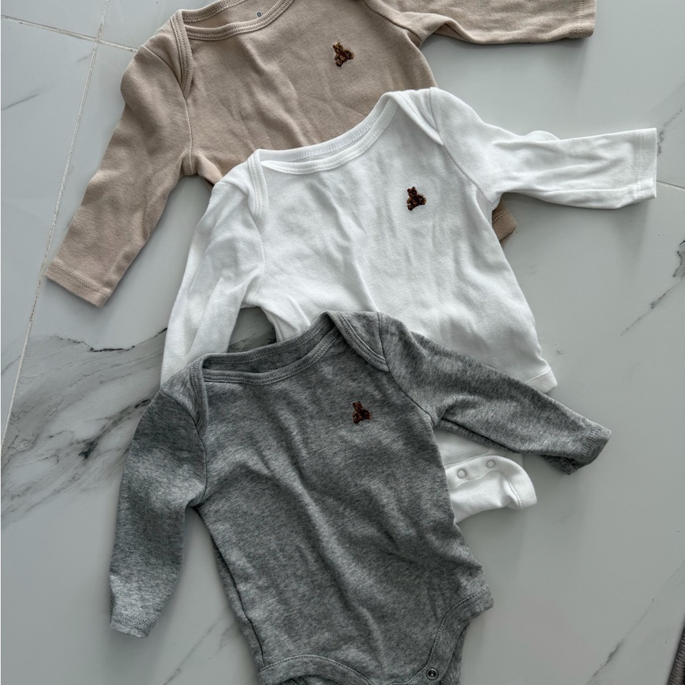GAP Kids One Pieces in White, Gray, and Tan